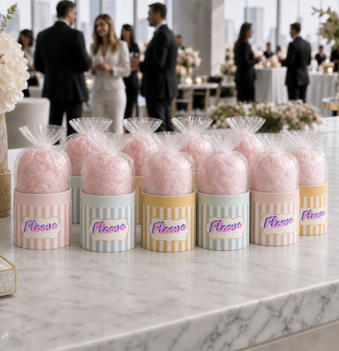 Potes listrados Floove com algodão doce rosa em evento corporativo
